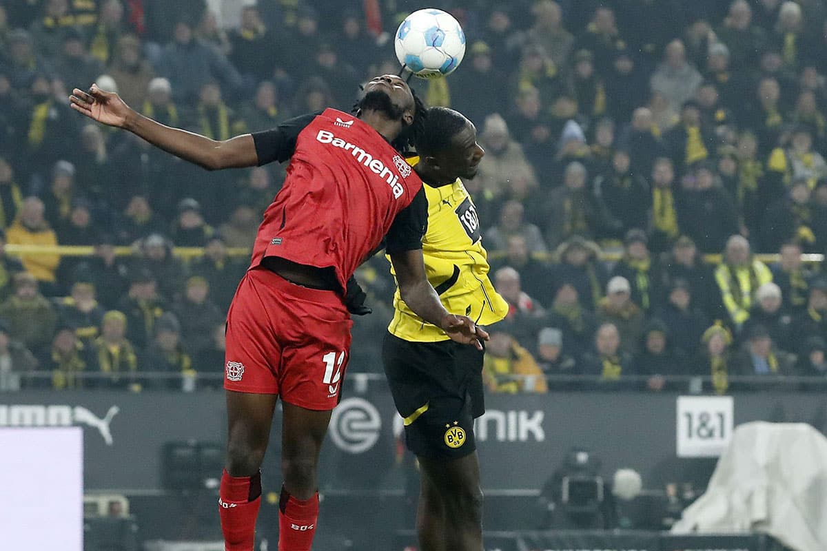 Edmond Tapsoba vs. Serhou Guirassy / Leverkusen Dortmund Tipp (© ANP / Alamy Stock Photo)